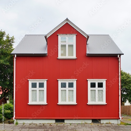 Typical red and white Icelandic wooden house in Reykjavik