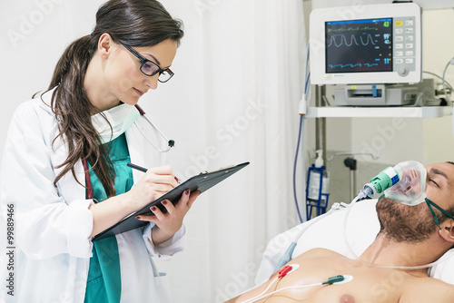 Εκτύπωση καμβά Doctor is caring a sick patient.