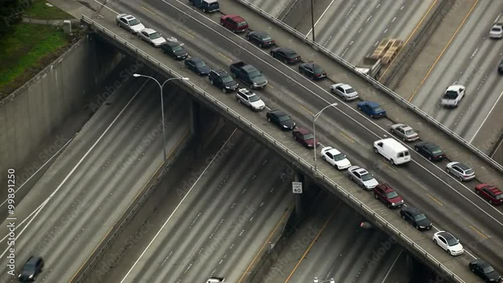 Static view looking down to traffic and overpass on I-5. Static view looking down to traffic and overpass on I-5.