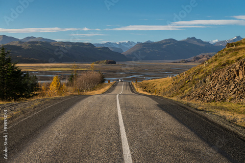 Road perspective with mountain range background in Autumn season Iceland