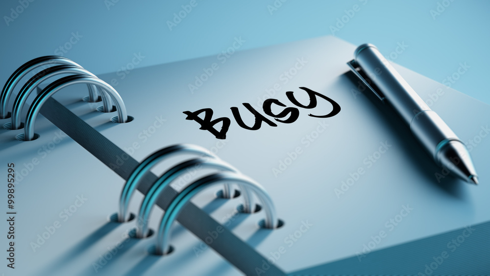 Closeup of a personal agenda setting an important date writing w Closeup of a personal agenda setting an important date writing w