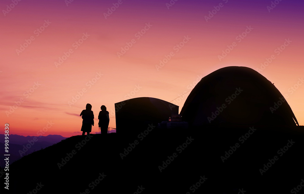 silhouettes people with tent on sunset view