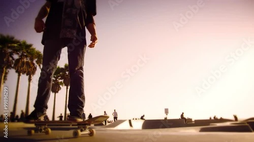 Wallpaper Mural Sunset activities at Ocean Front Walk near Venice Beach, California in slow motion with lens flare Torontodigital.ca