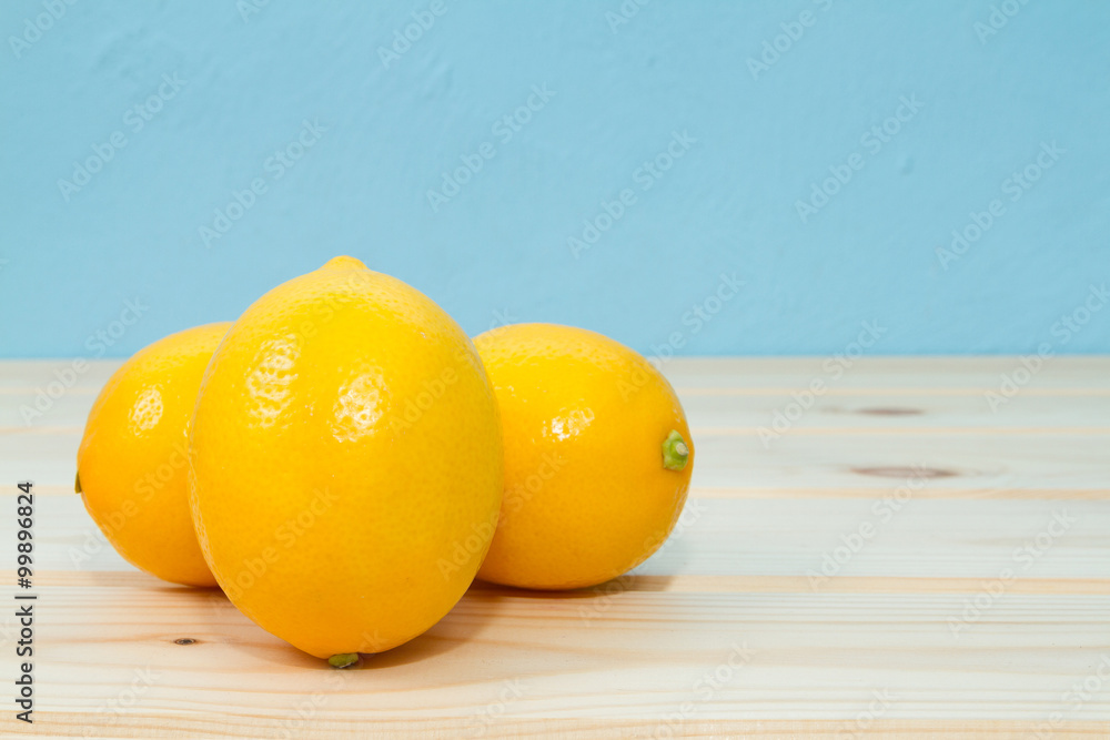 Bright yellow juicy lemons on table. Bright yellow juicy lemons on table.