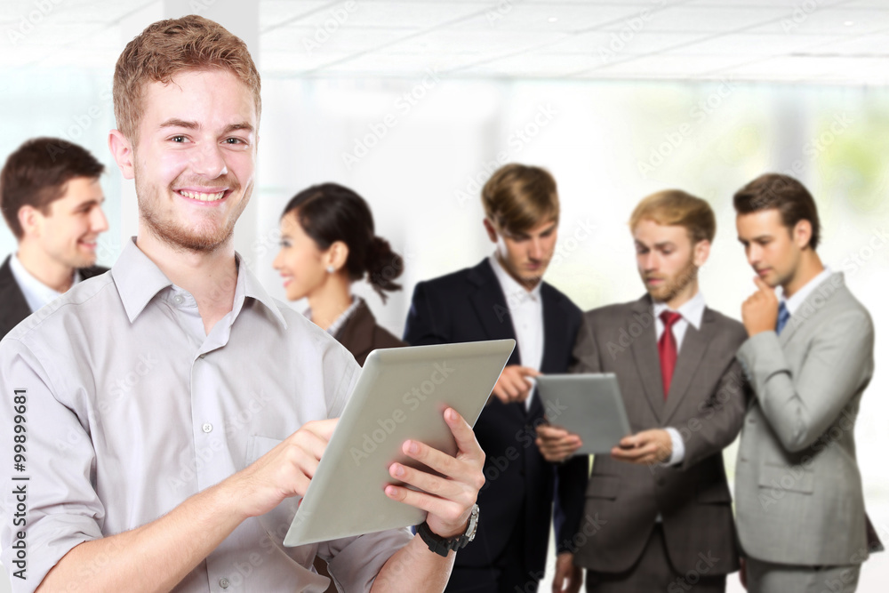 Group of mix-raced young businessperson and his team at the back Group of mix-raced young businessperson and his team at the back