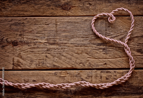 Fototapeta Naklejka Na Ścianę i Meble -  Valentine's day background with rope