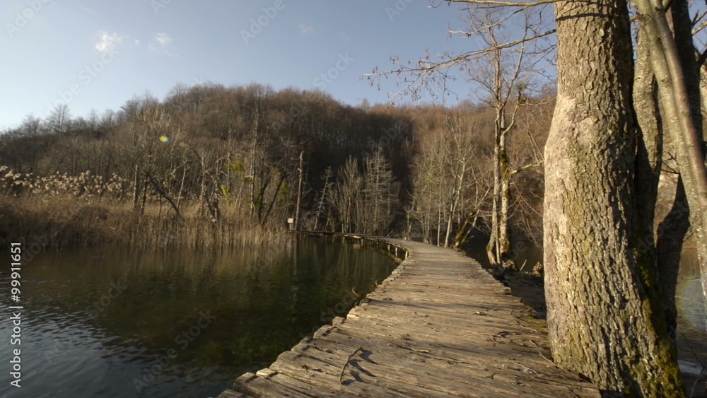 Walking on boarwalk throughout plitvice lakes national park waterfall Walking on boarwalk throughout plitvice lakes national park waterfall