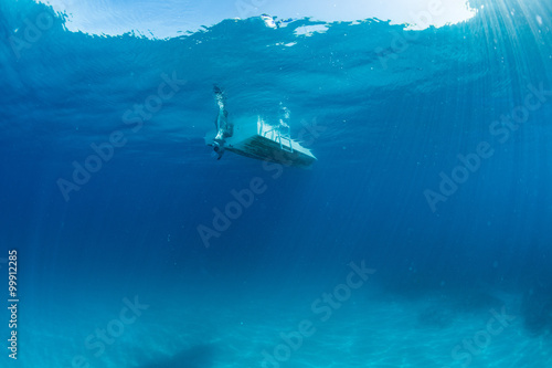 boat ship from underwater blue ocean