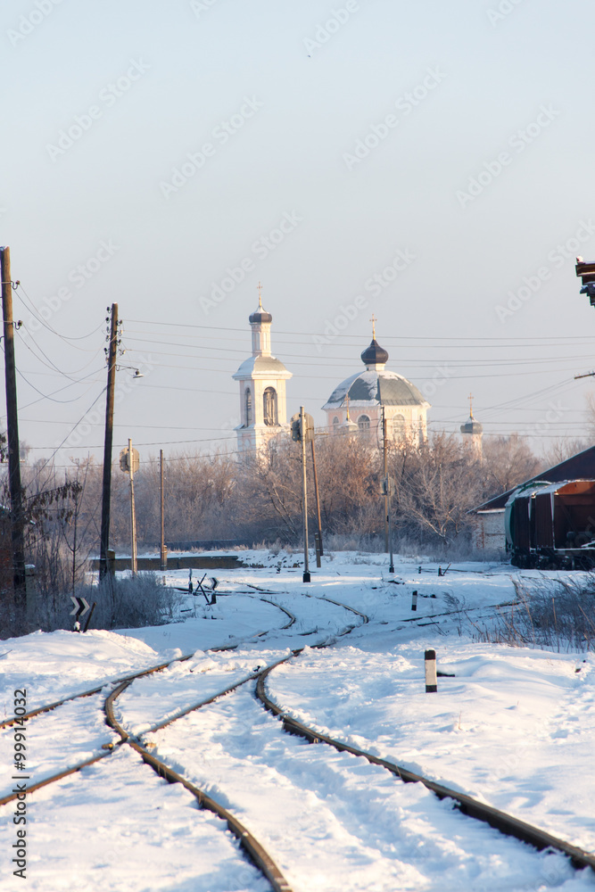 Fototapeta premium ..Snow-covered railway station, old wagons, in the Russian provi