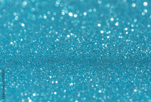 Blue glitter bokeh abstract light background