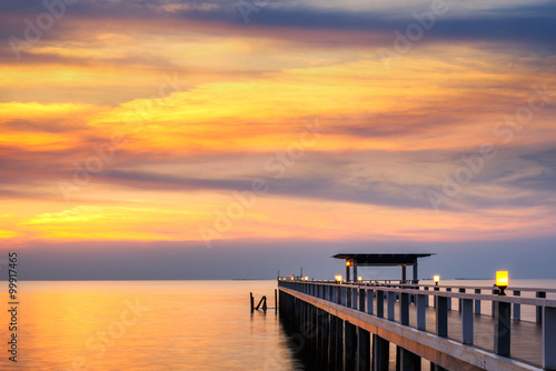 Summer  Travel  Vacation and Holiday concept - Wooden pier between sunset in Phuket  Thailand