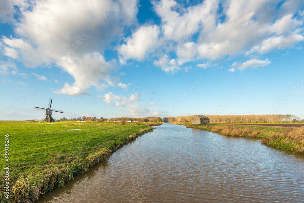 Dutch polder landscape with windmill