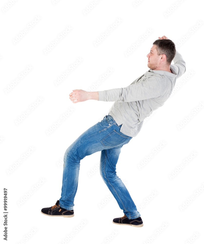 Balancing young man or dodge falling man Balancing young man or dodge falling man