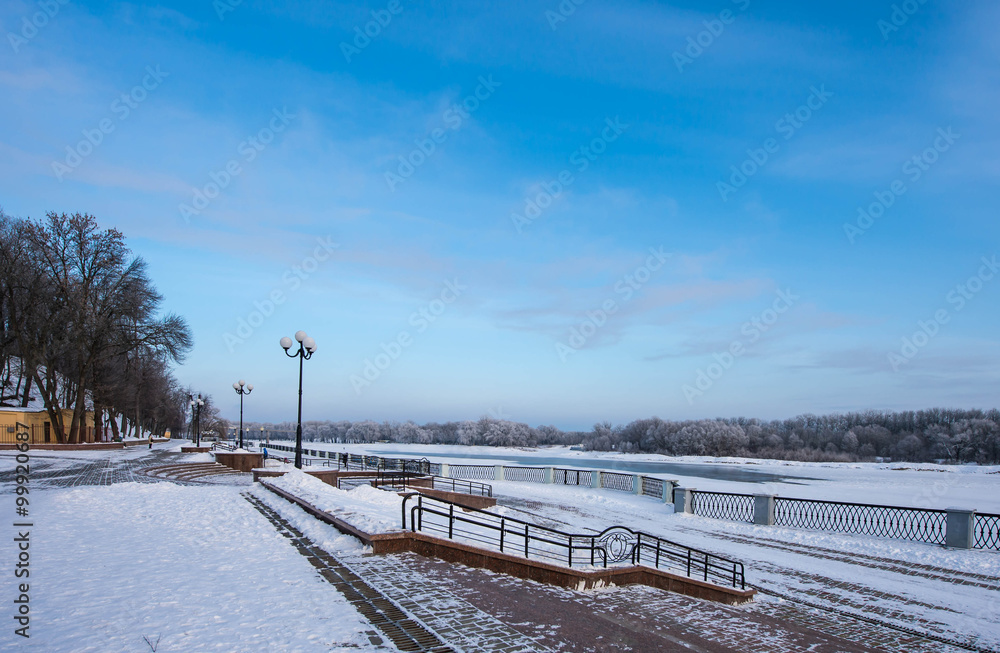 Embankment in the city park in the winter on a clear day Embankment in the city park in the winter on a clear day