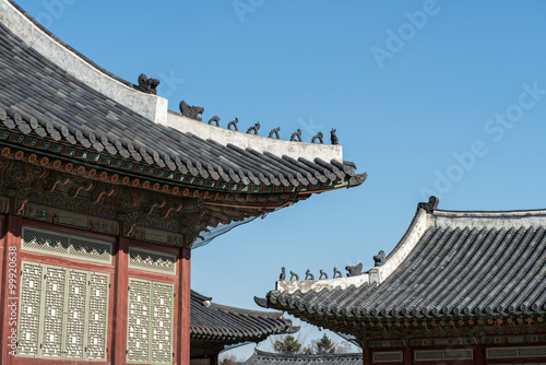 Traditional korea roof decoration. blue sky and Colorful structures
