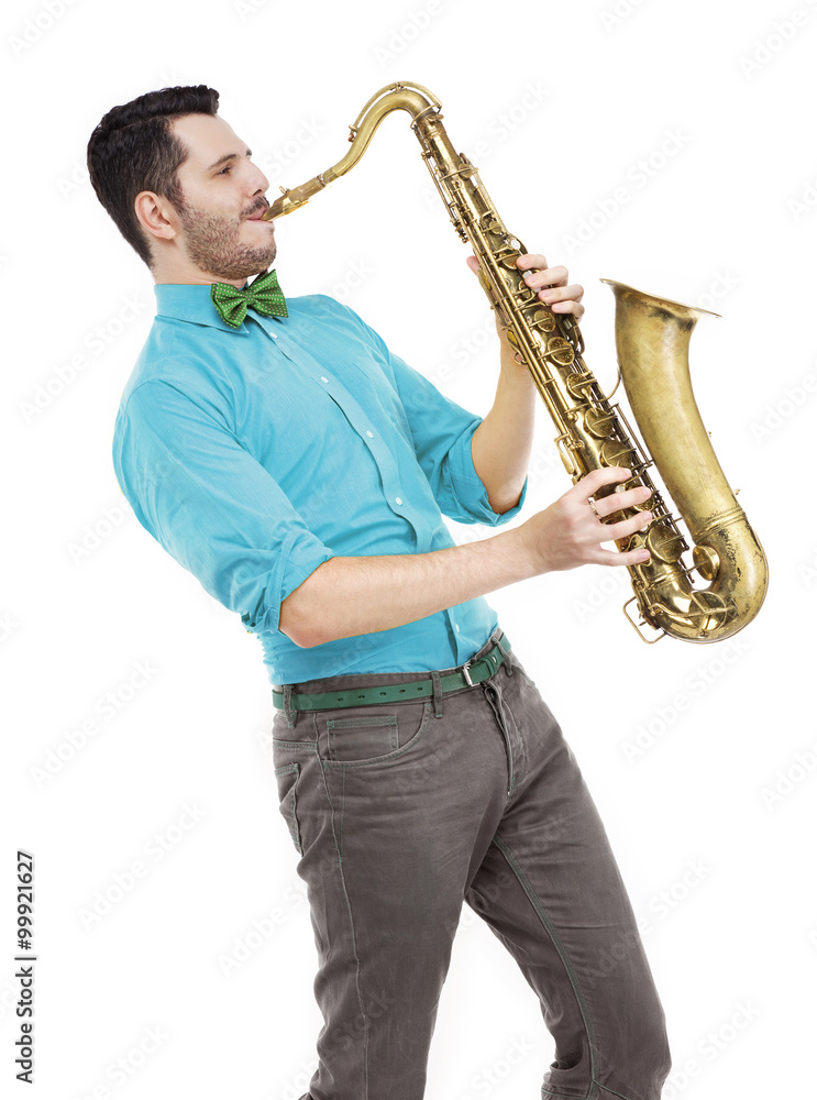 Fototapeta premium man saxophonist playing saxophone player in studio isolated on w