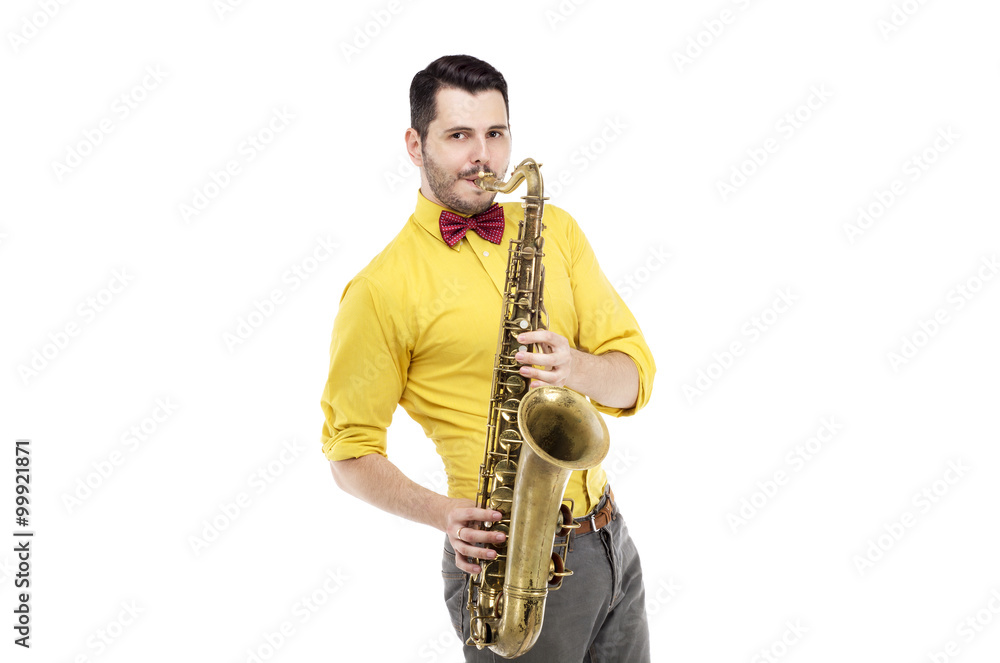 Naklejka premium man saxophonist playing saxophone player in studio isolated on w