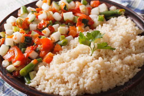 Couscous with stewed vegetable salad macro. horizontal
