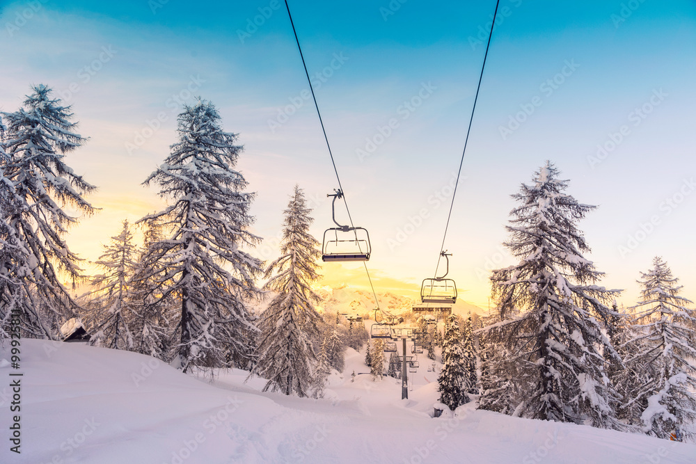Winter mountains panorama with ski slopes and ski lifts Winter mountains panorama with ski slopes and ski lifts
