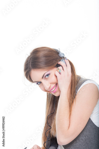 Music. Woman with headphones listening to music on mp3 player