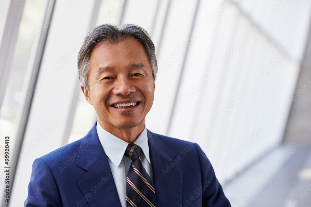 Portrait Of Asian Businessman In Modern Office Portrait Of Asian Businessman In Modern Office