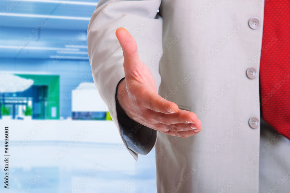 A business man with an open hand A business man with an open hand