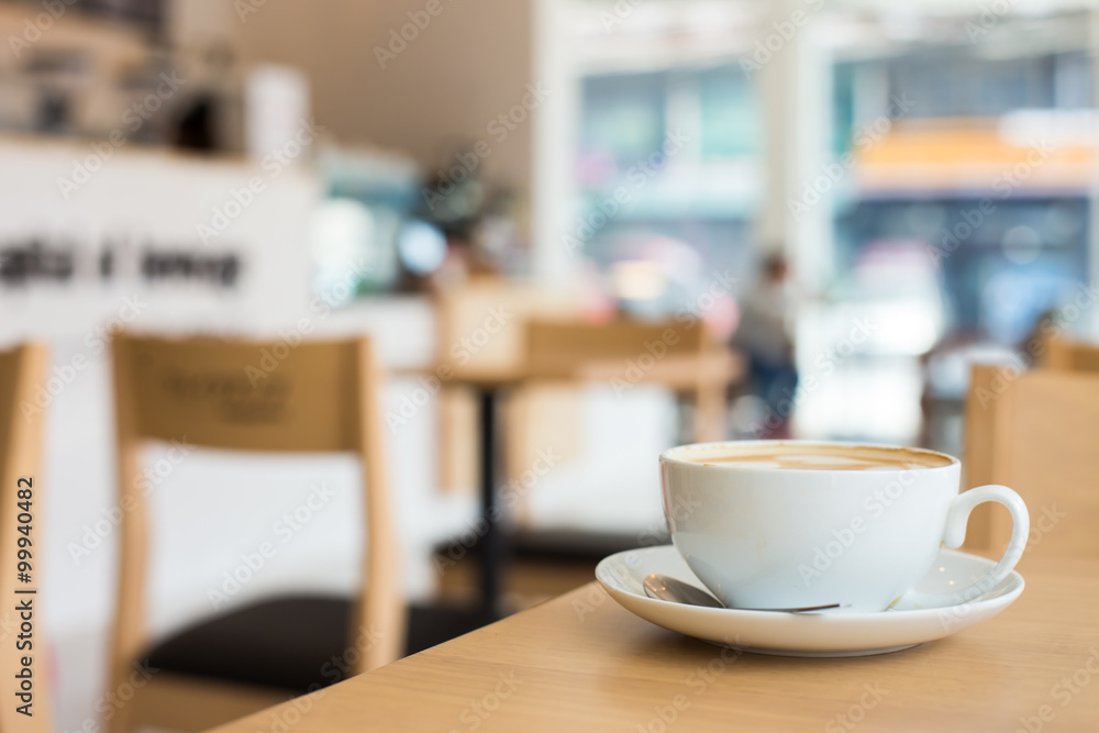 Hot art Latte Coffee in a cup on wooden table Hot art Latte Coffee in a cup on wooden table