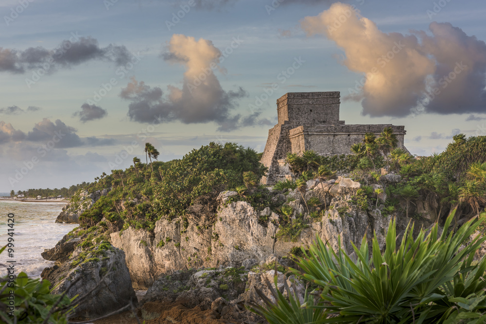 Mayan Castillo at Sunrise: The ancient ruin of a Mayan castle sitting on a cliff overlooking the beach at Tulum, Mexico Mayan Castillo at Sunrise: The ancient ruin of a Mayan castle sitting on a cliff overlooking the beach at Tulum, Mexico