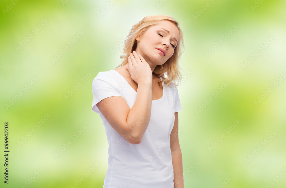 unhappy woman suffering from neck pain unhappy woman suffering from neck pain