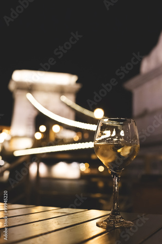 Photography glass of white wine in Budapest on the Danube River