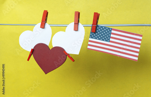 White  hearts - room for text,  USA ( America) flag hanging on c photo