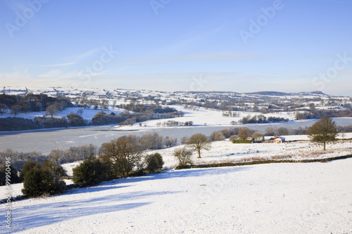 Fototapeta Naklejka Na Ścianę i Meble -  View to Rudyard Lake reservoir with snow in winter. Staffordshire England UK Britain Europe.