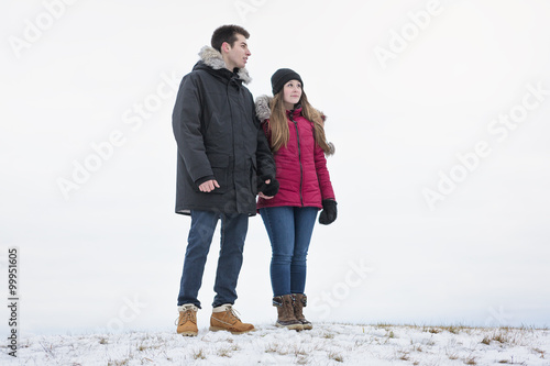 Two teenagers havinf fun on the snow field © Louis-Photo