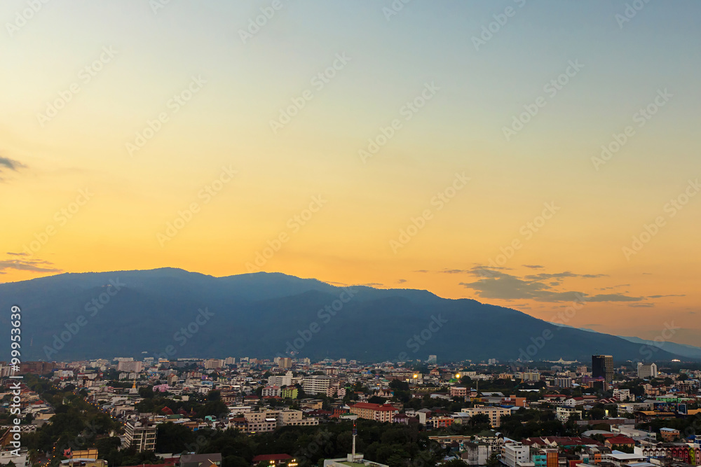 City and mountain in evening