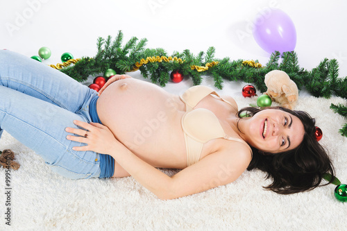 Bild auf Leinwand Pregnant Woman in Jeans