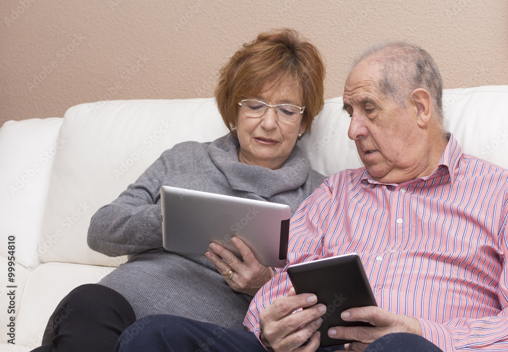 Happy senior couple with tablet pc computer Happy senior couple with tablet pc computer