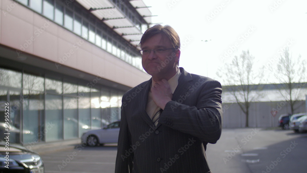 Sad business man walking relieved Sad business man walking relieved