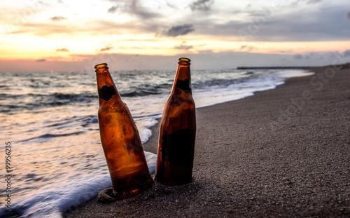 Bottle beer on the beach photo