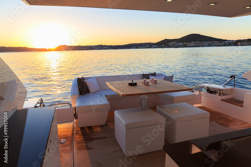 coffee on yacht at sunset