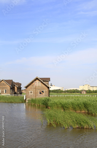 Wetland park of wooden houses