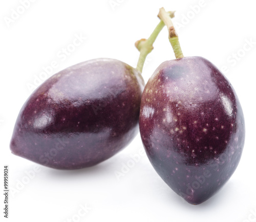 Two fresh olives on the white background.
