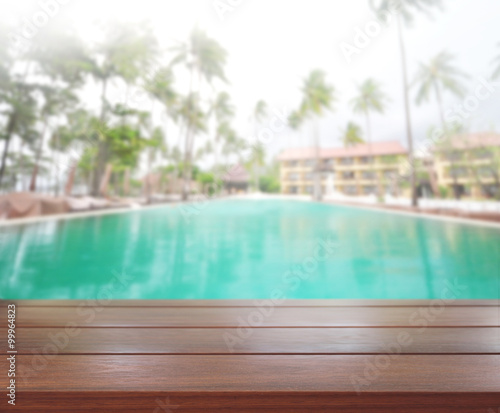 Wood Table Top of Background and Pool