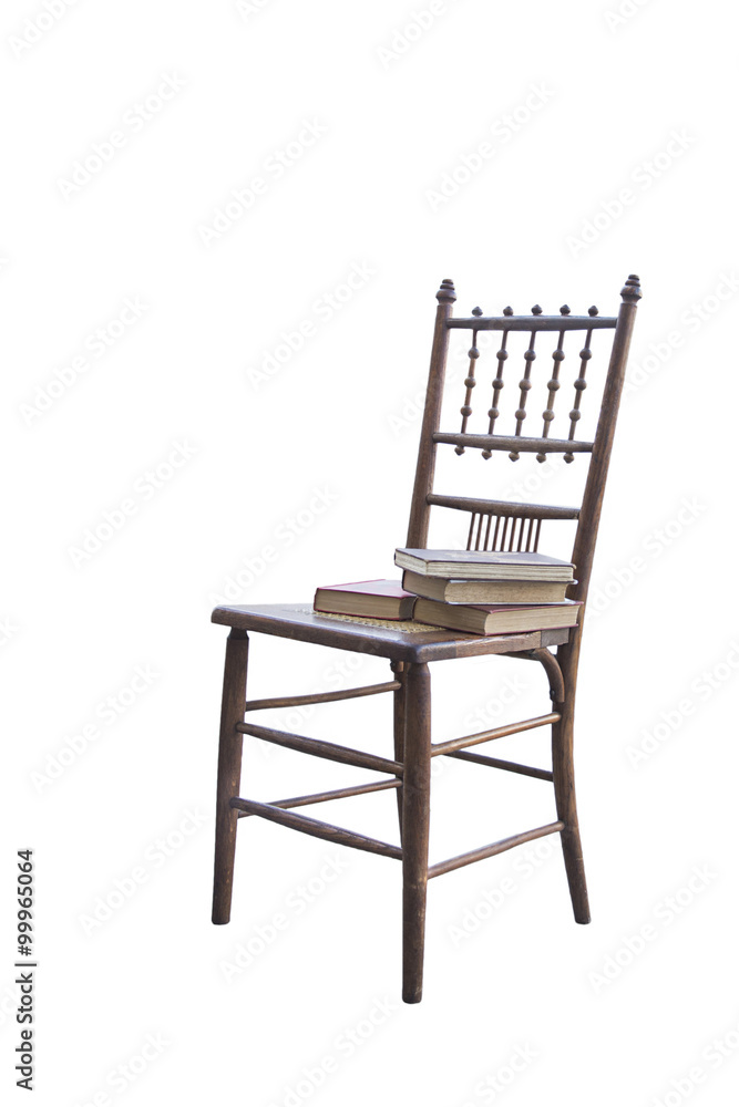 isolated chair with books stacked on them from a library or school isolated chair with books stacked on them from a library or school