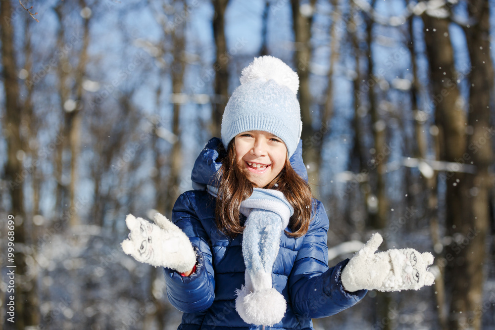 Little girl outdoors on beautiful winter snow day Little girl outdoors on beautiful winter snow day