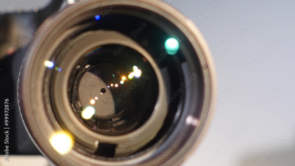 Diaphragm of a camera lens aperture, close up, open, glare