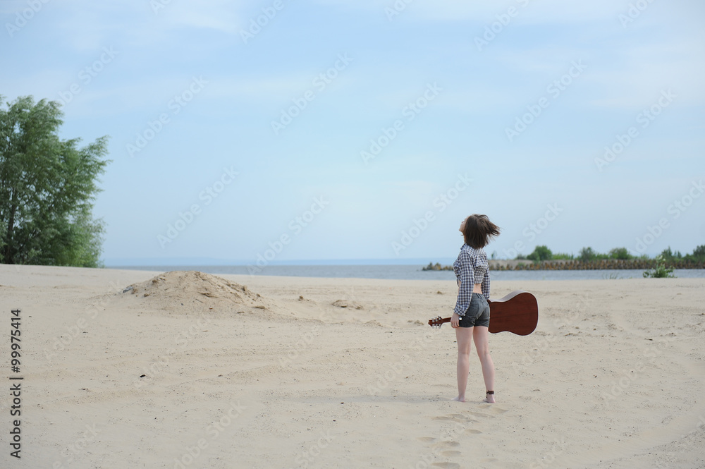 Young girl with a guitar