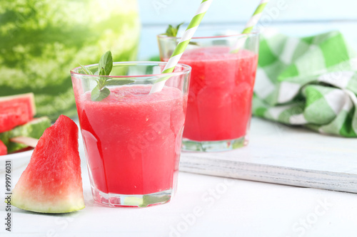 Fresh watermelon juice in the glass on wooden table