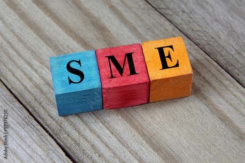 SME text (Small Medium Enterprises) on colorful wooden cubes