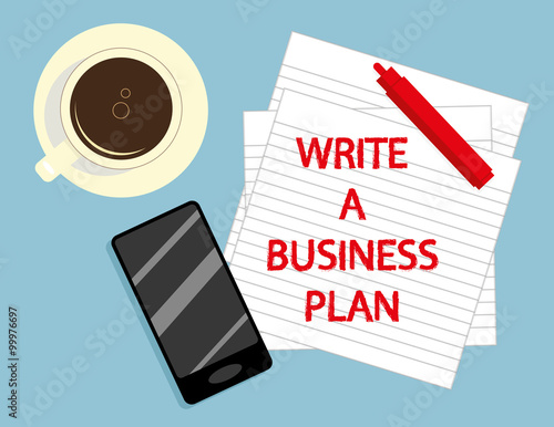 The words Write A Business Plan on lined paper in red text, surrounded by a smartphone, cup of coffee and a marker pen as preparation
