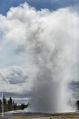 Steam erupts from Old Faithful geyser, Yellowstone, Wyoming.
